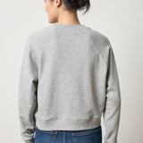 Back view of Lilla P Raglan Sweatshirt in French Terry 100% cotton, shorter length with relaxed fit, neutral tone