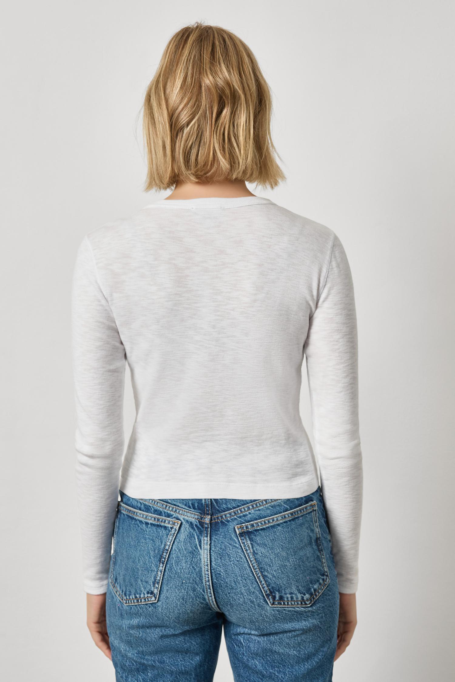 Back view of women's cotton ribbed long sleeve shirt by Lilla P in white with clean fit