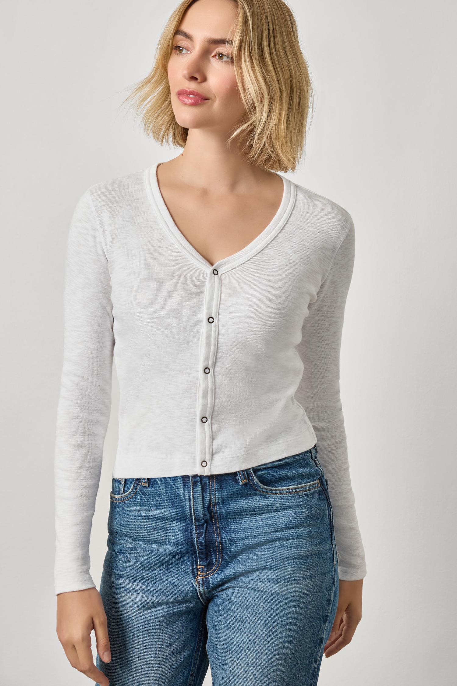 Women's ribbed cotton long sleeve top by Lilla P in white with snap V-neck and fitted silhouette