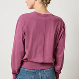 Back view of Lilla P Ribbed Trim Easy Crew in pink, lightweight women’s sweater with ribbed trim for fall outfit