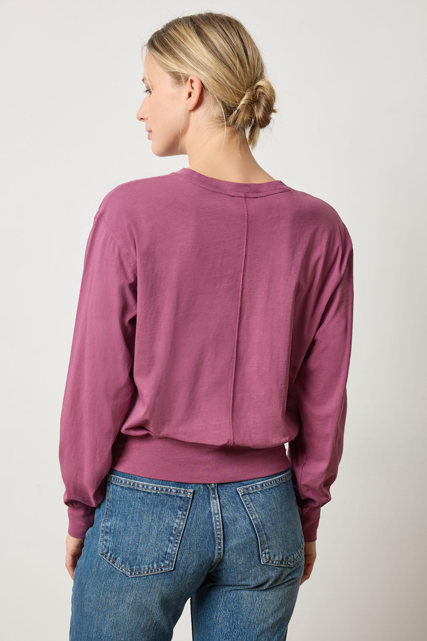 Back view of Lilla P Ribbed Trim Easy Crew in pink, lightweight women’s sweater with ribbed trim for fall outfit