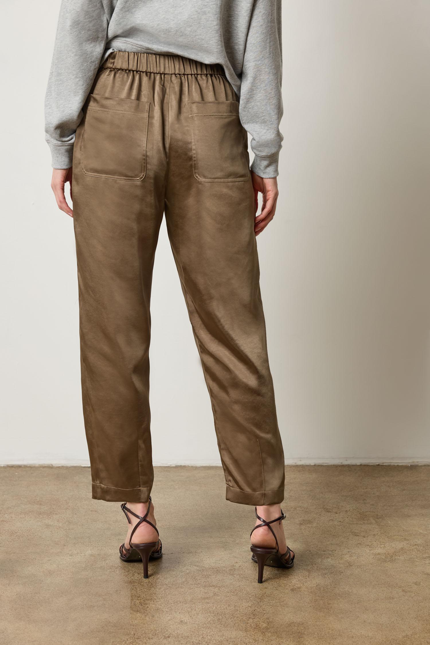 Back view of Lilla P Satin Fly Front Pant in satin twill, neutral colorway with elastic waistband, relaxed fit
