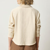 Back view of Lilla P Shirttail Polo sweatshirt top in French Terry 100% cotton, relaxed fit with shirttail hem, neutral tone