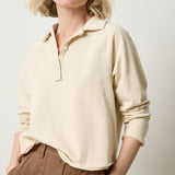 Lilla P Shirttail Polo sweatshirt top in French Terry cotton, neutral colorway with collar and button placket, relaxed fit, front view