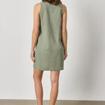 Back view of women's cotton mini dress by Lilla P in sage with relaxed fit and clean structure