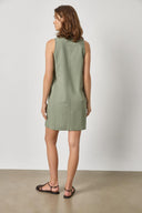 Back view of women's cotton mini dress by Lilla P in sage with relaxed fit and clean structure