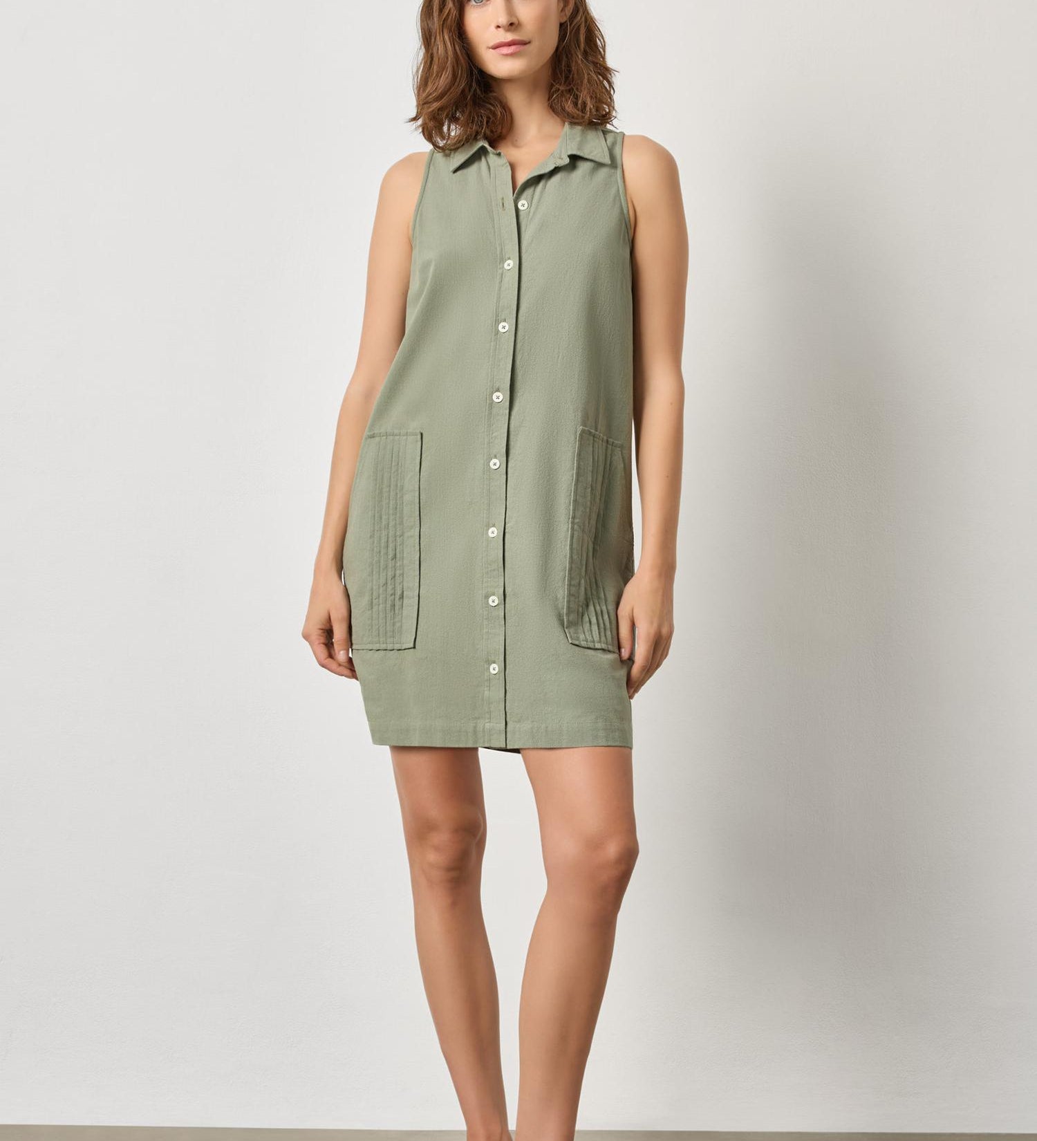 Women's sleeveless cotton shirt dress by Lilla P in sage with button front and collared neckline