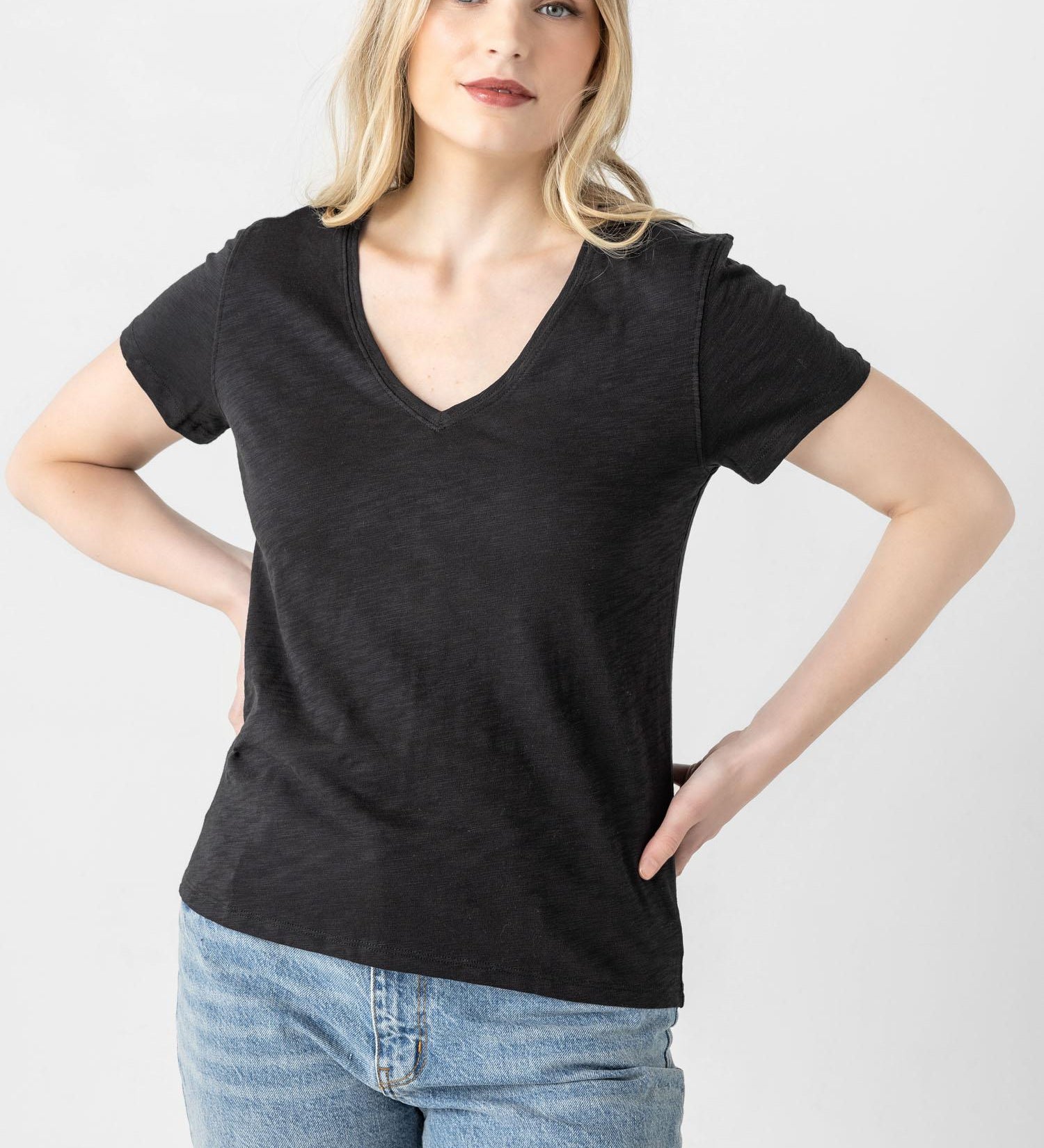 Lilla P V-neck short sleeve back seam tee in black – front view