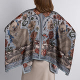 Back detail of hand-illustrated silk scarf blouse with botanical print and kitten motif from Sabina Savage collection