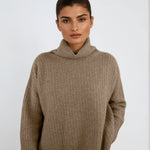 Not too slouchy, not too fitted — this cashmere favorite is made with natural fibers and designed in Telluride for everyday elegance.