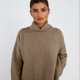 Not too slouchy, not too fitted — this cashmere favorite is made with natural fibers and designed in Telluride for everyday elegance.