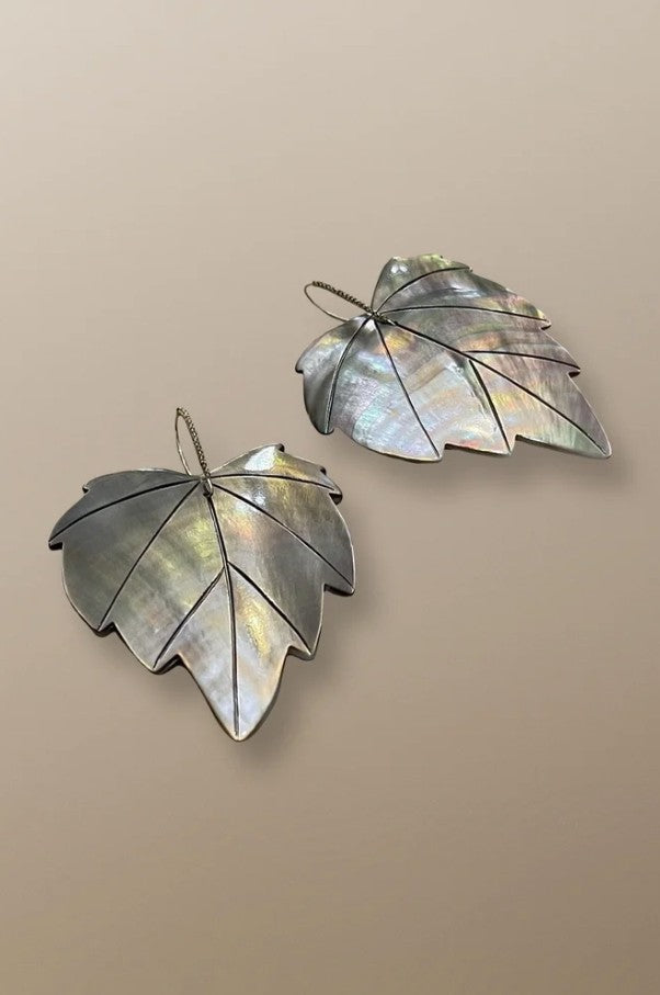 14k gold leaf drop earrings by Simon Alcantara with carved design and handwoven ear wires