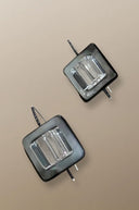 Mother of pearl and quartz drop earrings by Simon Alcantara in argentium silver with geometric design