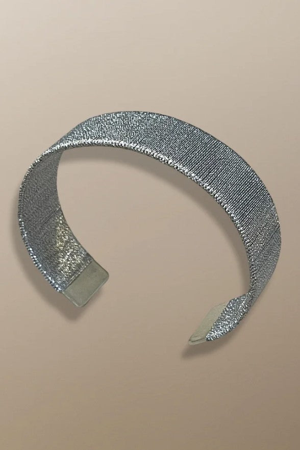 Handwoven sterling silver bracelet by Simon Alcantara with wide textured design