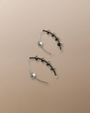 Simon Alcantara Helix Minor earrings in titanium pyrite and sterling silver with handwoven silver cord